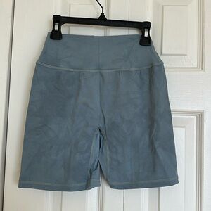 Alphalete small tie-dye blue high rise shorts.